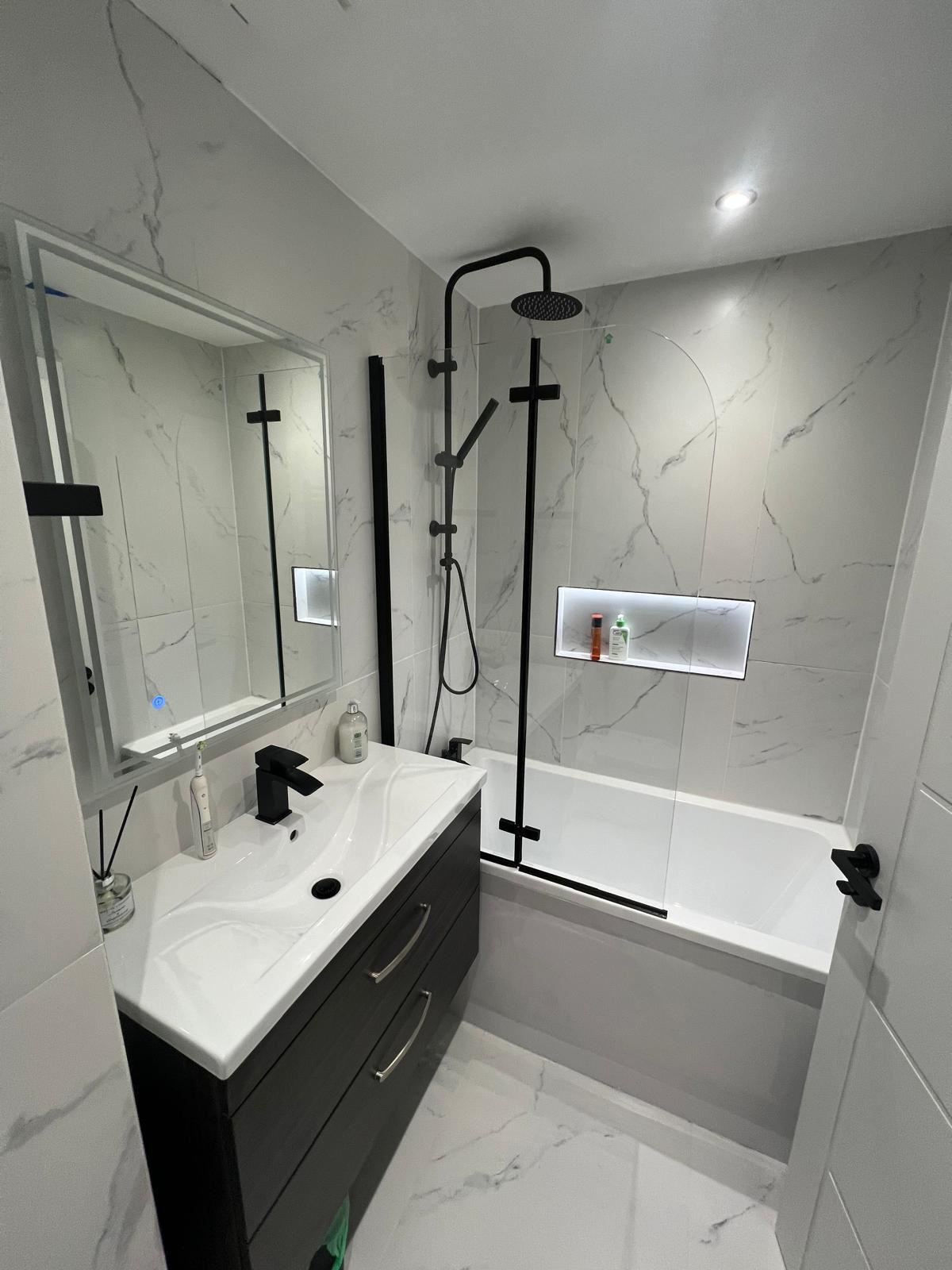 Bathroom renovation project showing custom bathroom design tailored to client lifestyle with modern fixtures